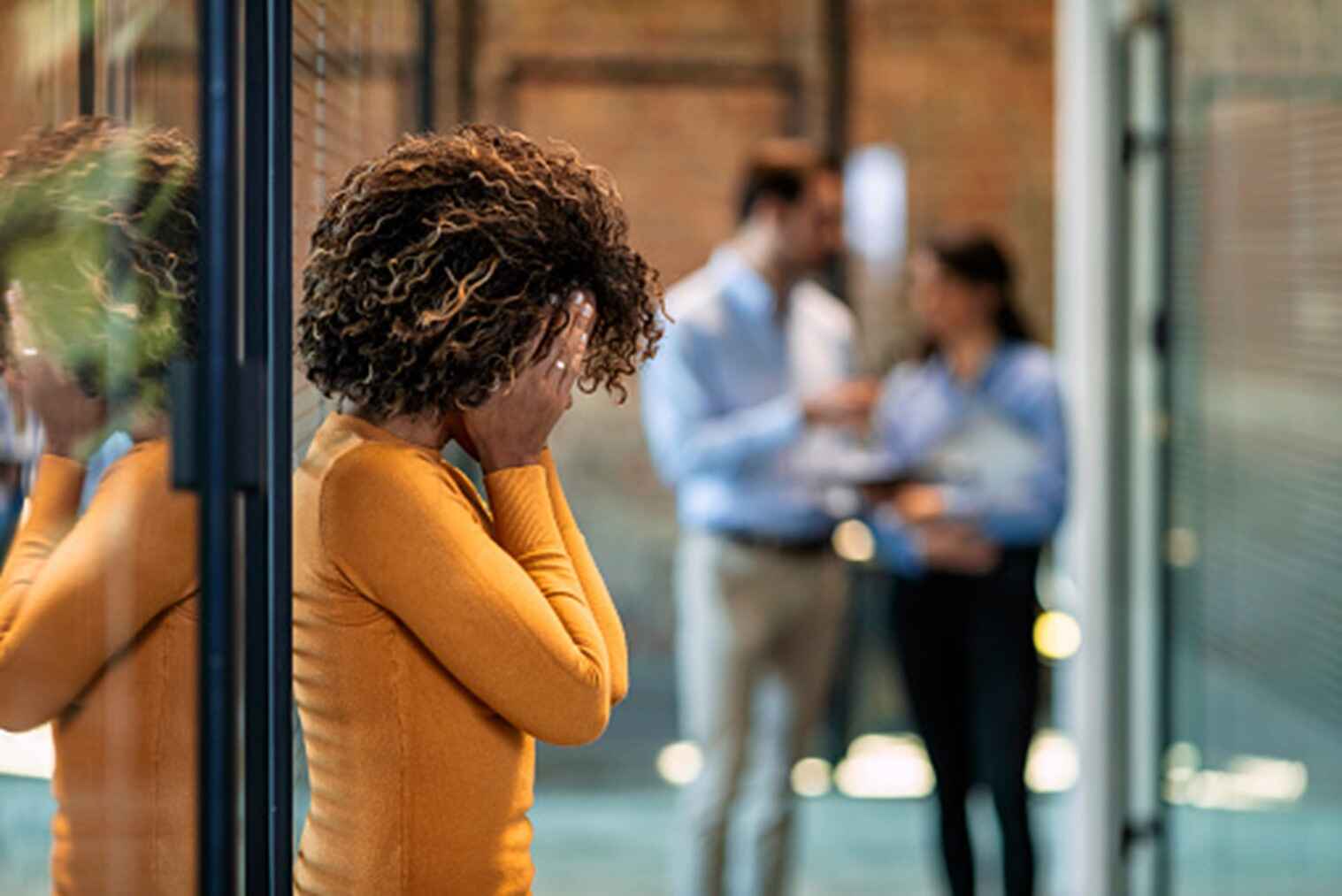 A woman is having an anxiety attack at her workplace
