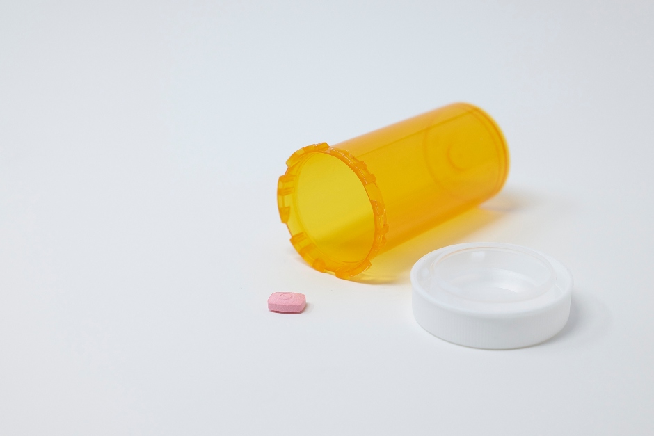 Anti-depressants falling out of the pill bottle 