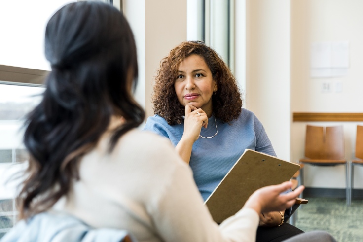 Patient in a virtual consultation with a MindWell Urgent Care doctor for a telepsychiatry session