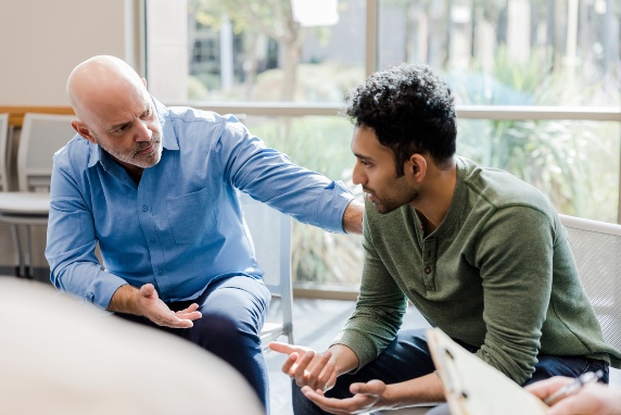 Patient in a virtual consultation with a MindWell Urgent Care doctor for a telepsychiatry session